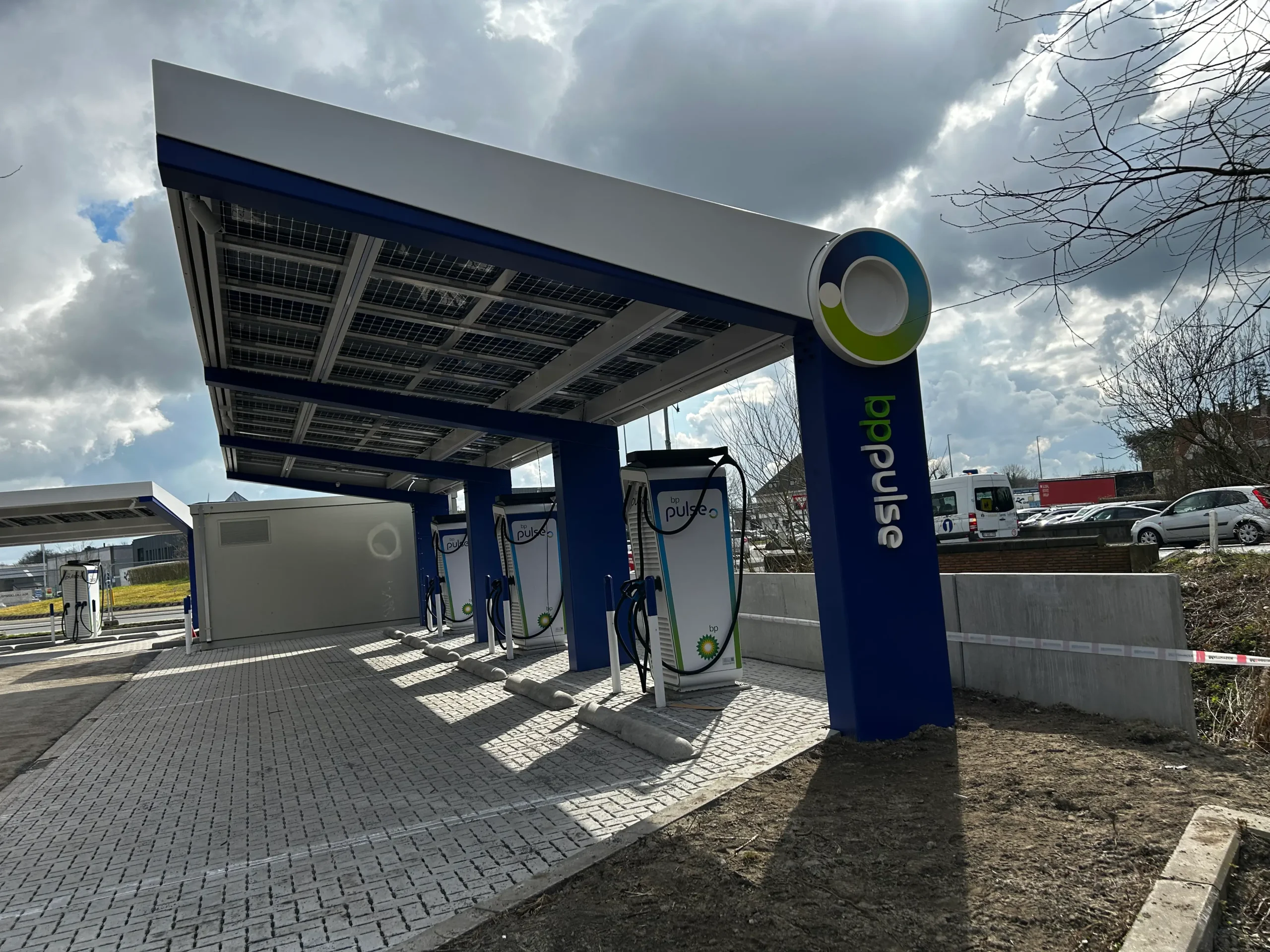 Covered forecourt parking with OPTI Bluetop Solar Parking and BlueRoof at BP Loppem