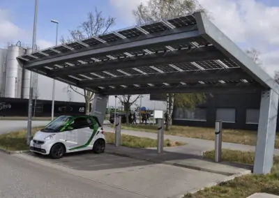 Mercedes Hamburg Germany Solar carport providing renewable energy and charging for electric vehicles under a sleek solar power canopy.